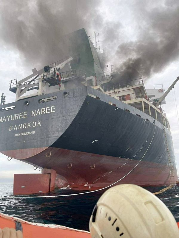 The Thailand-flagged cargo ship Mayuree Naree engulfed in black smoke in the Strait of Hormuz, March 11, 2026.  ROYAL THAI NAVY/Handout via REUTERS