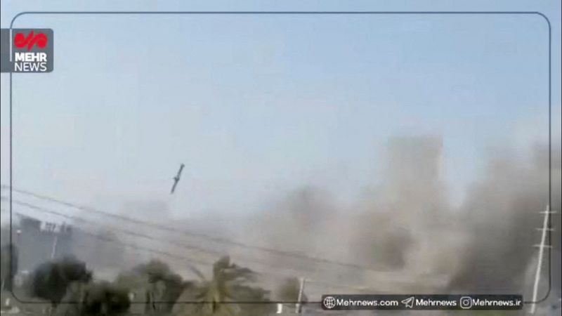 FILE PHOTO: A still image from video shows what experts say to Reuters appears to be a U.S. Tomahawk missile hitting near the Shajareh Tayyebeh girls' school in Minab, Hormozgan province, Iran, February 28, 2026, amid the U.S.-Israeli conflict with Iran. MEHR NEWS/Handout via REUTERS  THIS IMAGE HAS BEEN SUPPLIED BY A THIRD PARTY. MANDATORY CREDIT. NO RESALES. NO ARCHIVES. MUST NOT OBSCURE LOGO.   VERIFICATION: - Reuters confirmed the location from the buildings, trees, utility poles, wall and road layout, which matched satellite imagery of the area.  - Coordinates from where the video was taken: 27.105714752109524, 57.08551574115519.  - The date when the video was filmed was confirmed from the verified aftermath visuals and satellite imagery taken on the morning of February 28, which showed intact buildings at the location of the strike.  - Smoke visible in the video before the missile strike is coming from the direction of the school.  - Two experts told Reuters that the missile seen in the video appears to be the U.S. Tomahawk missile - Joseph Dempsey, a military analyst with London's International Institute for Strategic Studies, said the missile seen in the video is highly likely to be a variant of the Tomahawk missile and that it doesn't appear to match any other known cruise missile in operation by the countries involved in the conflict.  - Joost Oliemans, a Netherlands-based conflict analyst who specialises in military equipment, told Reuters that based on the available footage, there are no plausible alternative candidates and that Israel and Iran are not among the few countries that operate very similar missiles./File Photo