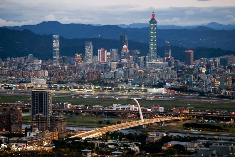 A general view shows Taipei city skyline, including the Taipei 101 skyscraper, with Songshan Airport in the foreground in Taipei, Taiwan February 23, 2026. REUTERS/Ann Wang