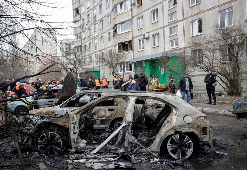 Destroyed vehicles at the site of a Russian drone strike, amid Russia's attack on Ukraine, in Kharkiv, Ukraine, March 25, 2026.  REUTERS/Sofiia Gatilova