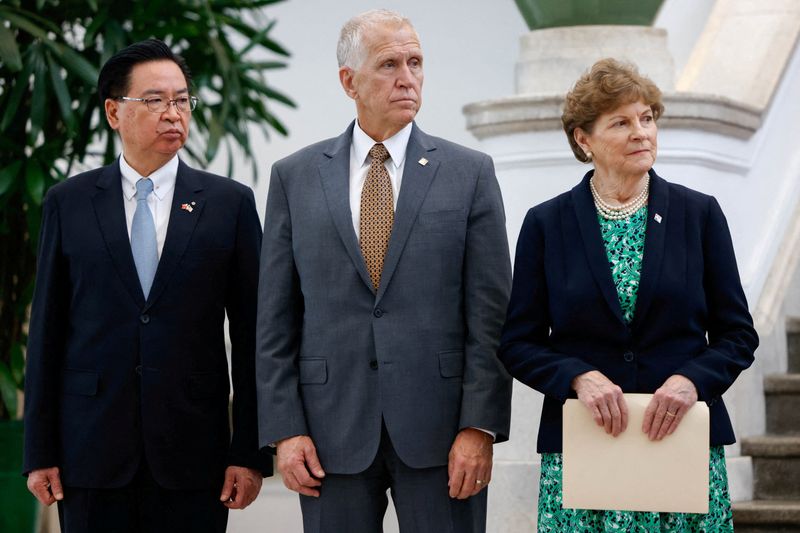 Taiwan's National Security Council Secretary-General Joseph Wu, U.S. Senators Thom Tillis (R-NC) and Jeanne Shaheen (D-NH) attend a press conference at the Presidential Office Building in Taipei, Taiwan, March 30, 2026. REUTERS/Ann Wang
