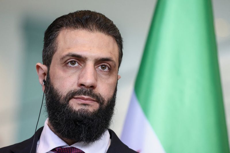 Syrian President Ahmed al-Sharaa speaks as he holds a press conference with German Chancellor Friedrich Merz at the Chancellery, in Berlin, Germany, March 30, 2026. REUTERS/Nadja Wohlleben/File Photo