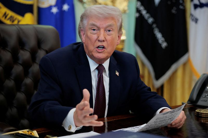 U.S. President Donald Trump speaks during the signing ceremony for an execituve order on mail ballots, in the Oval Office of the White House in Washington, D.C., March 31, 2026.  REUTERS/Evan Vucci
