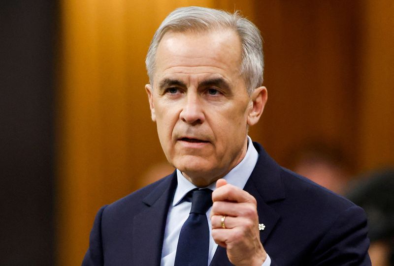 FILE PHOTO: Canada's Prime Minister Mark Carney speaks during Question Period in the House of Commons on Parliament Hill in Ottawa, Ontario, Canada, March 25, 2026.  REUTERS/Patrick Doyle/File Photo
