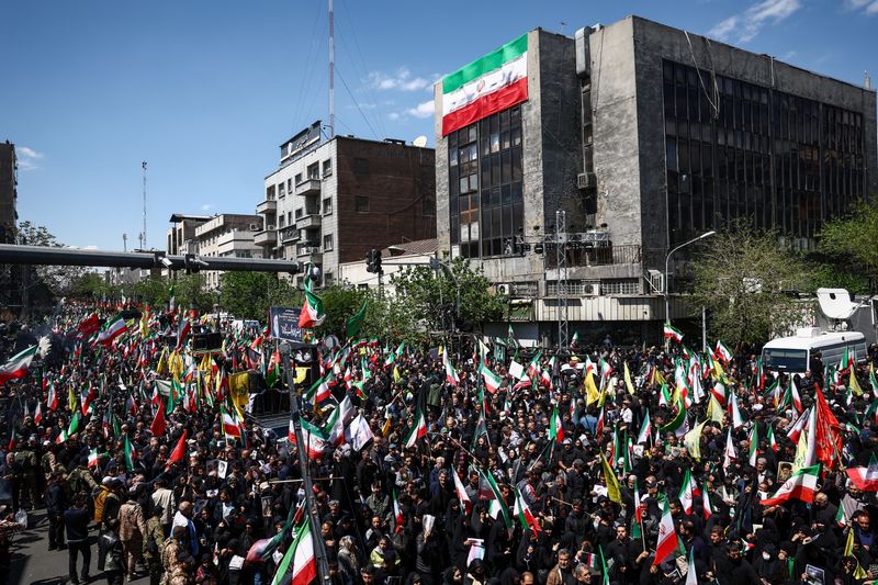 Iranian people attend a ceremony marking 40 days since the late Supreme Leader of Iran, Ayatollah Ali Khamenei, was killed in Israeli and U.S. strikes, in Tehran, Iran, April 9, 2026. Majid Asgaripour/WANA (West Asia News Agency) via REUTERS