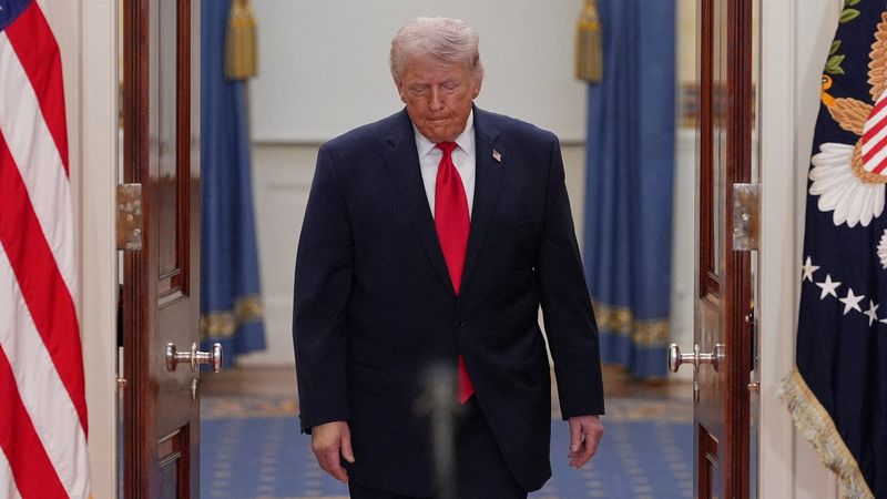 FILE PHOTO: President Donald Trump arrives to speak about the Iran war from the Cross Hall of the White House on Wednesday, April 1, 2026, in Washington.     Alex Brandon/Pool via REUTERS/File Photo