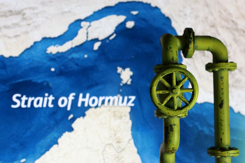 FILE PHOTO: A map showing the Strait of Hormuz and a 3D printed oil pipeline are seen in this illustration taken March 23, 2026. REUTERS/Dado Ruvic/Illustration//File Photo
