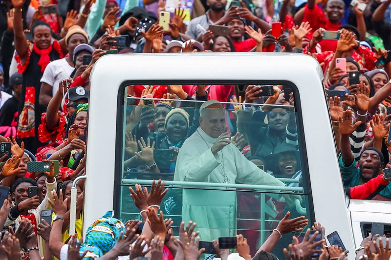 Pope Leo XIV arrives to hold a holy Mass for peace and justice at Bamenda airport in Bamenda, Cameroon, April 16, 2026. REUTERS/Guglielmo Mangiapane