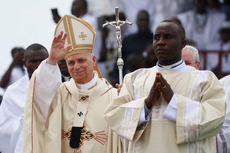 FILE PHOTO: Pope Leo XIV arrives to hold a holy Mass near Japoma Stadium in Douala, Cameroon, April 17, 2026. REUTERS/Guglielmo Mangiapane/File Photo