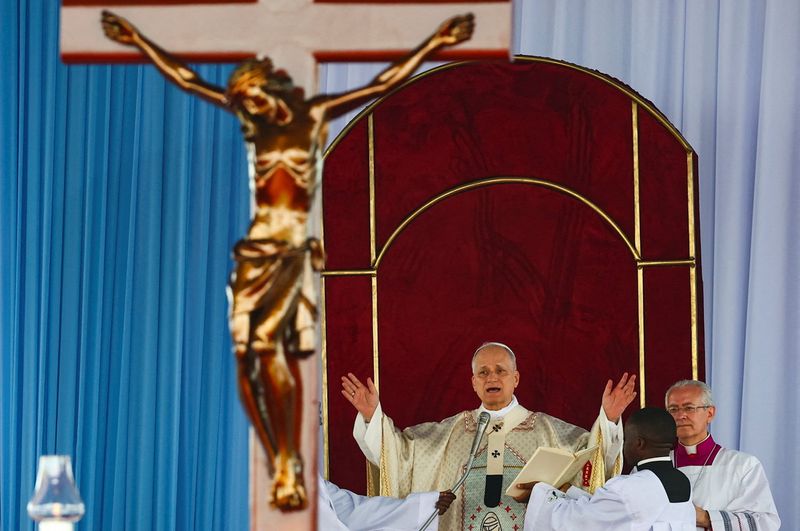 Pope Leo XIV holds a holy Mass at Yaounde-Ville Airport in Yaounde, Cameroon, April 18, 2026. REUTERS/Guglielmo Mangiapane