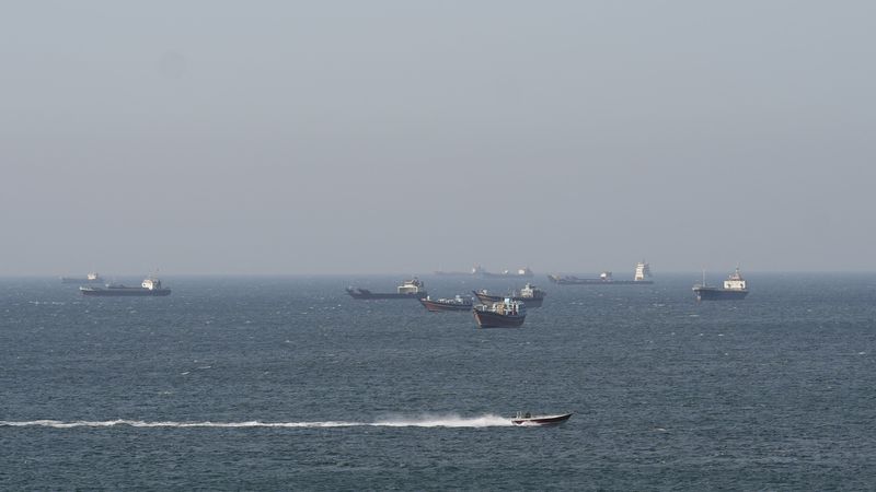 Ships and tankers in the Strait of Hormuz off the coast of Musandam, Oman, April 18, 2026. REUTERS/Stringer/File Photo
