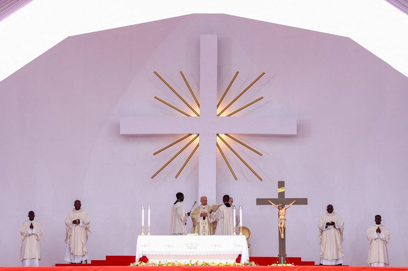 Pope Leo XIV leads a Holy Mass during his apostolic journey in Africa, in Kilamba, Luanda province, Angola, April 19, 2026. REUTERS/Guglielmo Mangiapane