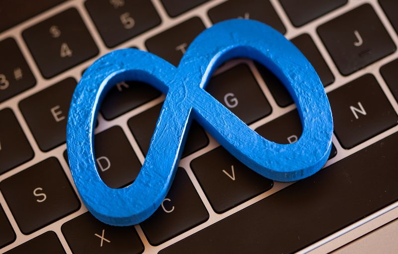 A 3D printed logo of Meta is placed on laptop keyboard in this illustration taken on November 2, 2021. REUTERS/Dado Ruvic/Illustration