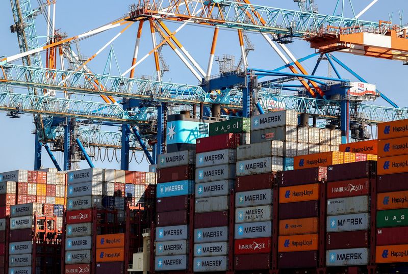 FILE PHOTO: Cranes unload Containers off the Maribo Maersk container ship at a terminal wharf in Bremerhaven, Germany, August 13, 2025. REUTERS/Leon Kuegeler/File Photo