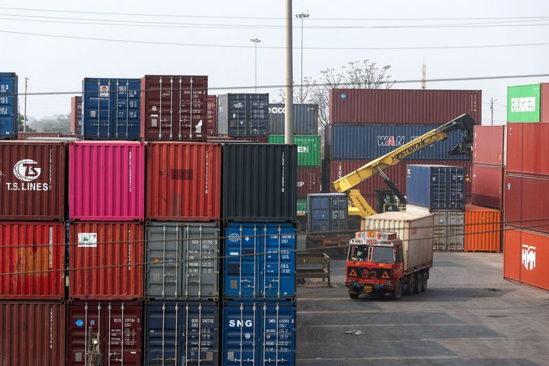 A person drives a truck inside a shipping container yard in Navi Mumbai, India, February 4, 2026. REUTERS/Francis Mascarenhas