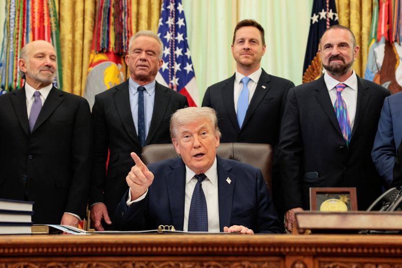 U.S. President Donald Trump points a finger as he participates in a healthcare affordability event in the Oval Office at the White House in Washington, D.C., U.S., April 23, 2026. REUTERS/Kylie Cooper
