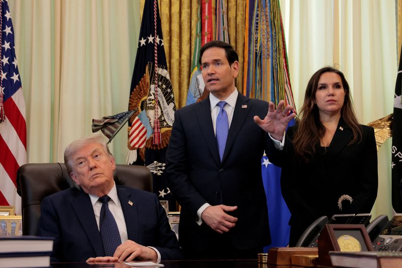 U.S. Secretary of State Marco Rubio, next to President Donald Trump, speaks to the media in the Oval Office at the White House in Washington, D.C., U.S., April 23, 2026. REUTERS/Kylie Cooper