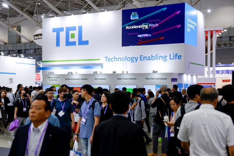 Visitors gather at the Tokyo Electron Ltd (TEL) booth at SEMICON 2025 in Taipei, Taiwan, September 10, 2025. REUTERS/Ann Wang