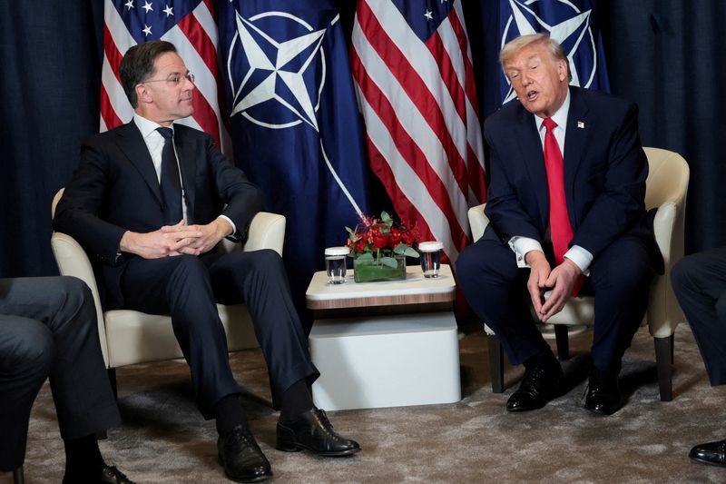 FILE PHOTO: U.S. President Donald Trump holds a bilateral meeting with NATO Secretary General Mark Rutte at the World Economic Forum (WEF) in Davos, Switzerland, January 21, 2026. REUTERS/Jonathan Ernst/File Photo