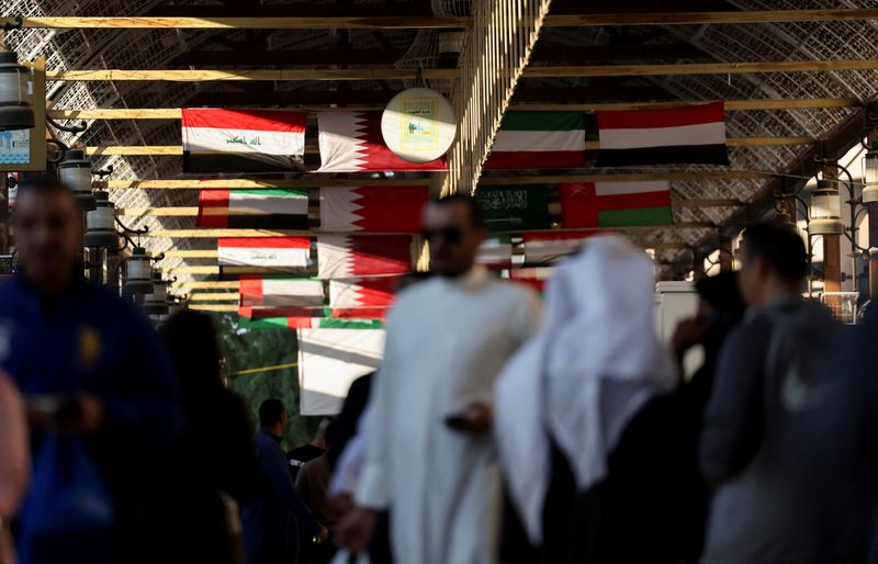 Gulf Cooperation Council (GCC) countries national flags are seen hanging in Mubarakiya Market in Kuwait City, Kuwait, December 23, 2024. REUTERS /Mohamed Abd El Ghany