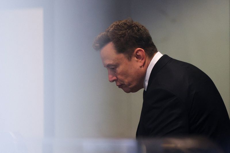 Elon Musk appears in the courthouse to attend the trial in his lawsuit over OpenAI for-profit conversion at a federal courthouse, in Oakland, California, U.S., April 29, 2026.  REUTERS/Manuel Orbegozo