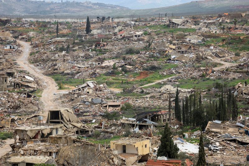 FILE PHOTO: Buildings destroyed during an Israeli military operation lie in ruins near the border with Israel, in Kfar Kila, southern Lebanon, February 19, 2026. REUTERS/Aziz Taher/File Photo