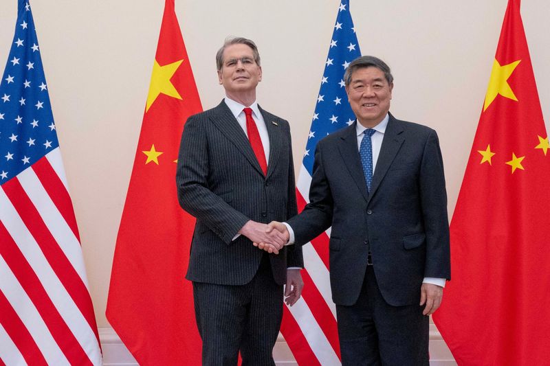 FILE PHOTO: U.S. Treasury Secretary Scott Bessent and Chinese Vice Premier He Lifeng shake hands during trade talks at OECD (Organisation for Economic Co-operation and Development) headquarters in Paris, France, March 16, 2026. The U.S. Treasury/Handout via REUTERS/File Photo