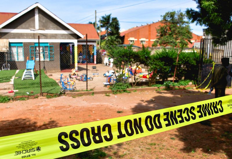 Police tape at the scene after a man posing as a parent stabbed and killed children at a school in Kampala, Uganda, April 2, 2026. REUTERS/Abubaker Lubowa