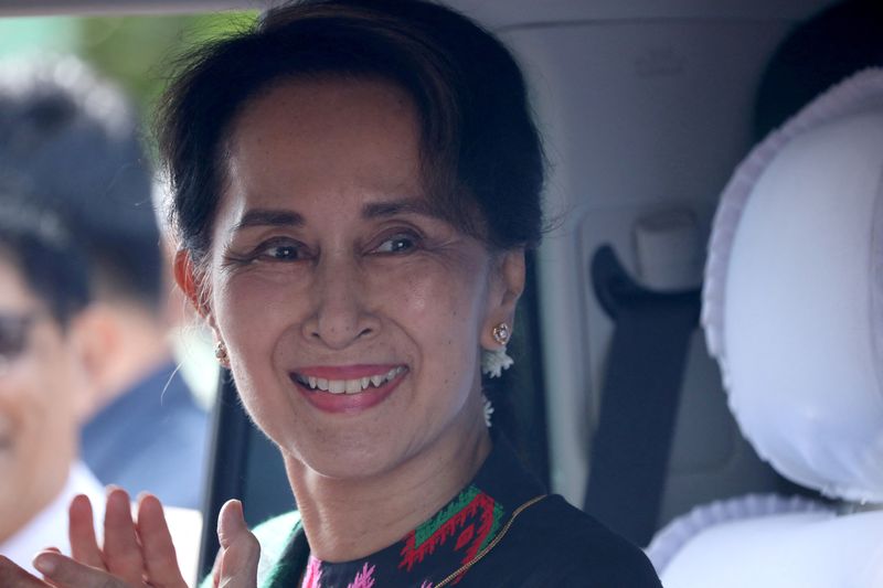 FILE PHOTO: Myanmar's State Counsellor Aung San Suu Kyi arrives at a school in Kawhmu, Yangon, Myanmar, July 18, 2019. REUTERS/Ann Wang/File Photo