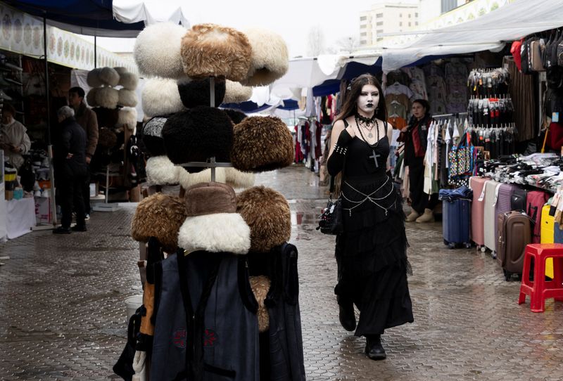 People walk through an open bazaar in Ashgabat, Turkmenistan, March 17, 2026. REUTERS/Umit Bektas