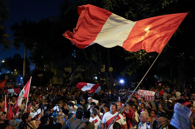 Demonstrators gather outside Peru's electoral headquarters amid concerns about the voting process during the country's general election, in Lima, Peru, April 14, 2026. REUTERS/Manuel Orbegozo