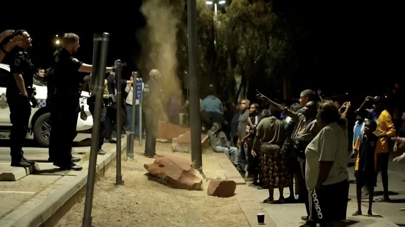 Community unrest outside Alice Springs Hospital, where a 47-year-old man arrested in connection with the alleged killing of five-year-old Kumanjayi Little Baby was taken, in Alice Springs, Australia, released May 1, 2026, in this screengrab taken from a video. AUSTRALIAN BROADCASTING CORPORATION/via REUTERS