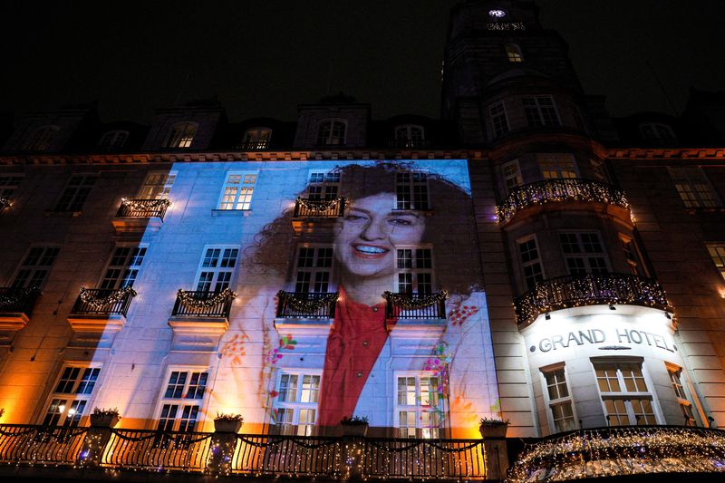FILE PHOTO: A picture of Nobel Peace Prize winner Narges Mohammadi on the wall of the Grand Hotel in central Oslo before the Nobel banquet, in connection with the awarding of the Nobel Peace Prize 2023, in Oslo, Norway December 10, 2023. NTB/Javad Parsa via REUTERS