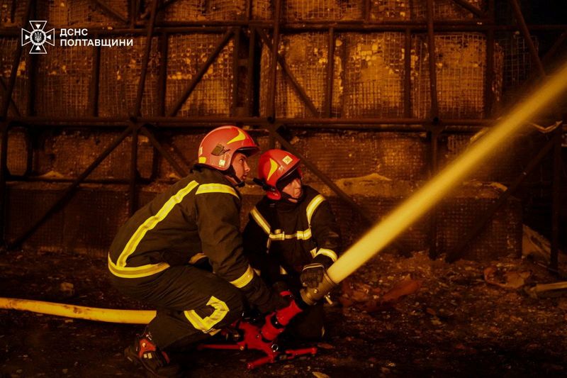 Firefighters work at the site of a natural gas production facility which was hit by Russian drone and missile strikes, amid Russia's attack on Ukraine, in Poltava region, Ukraine May 5, 2026. Press service of the State Emergency Service of Ukraine in Poltava region/Handout via REUTERS