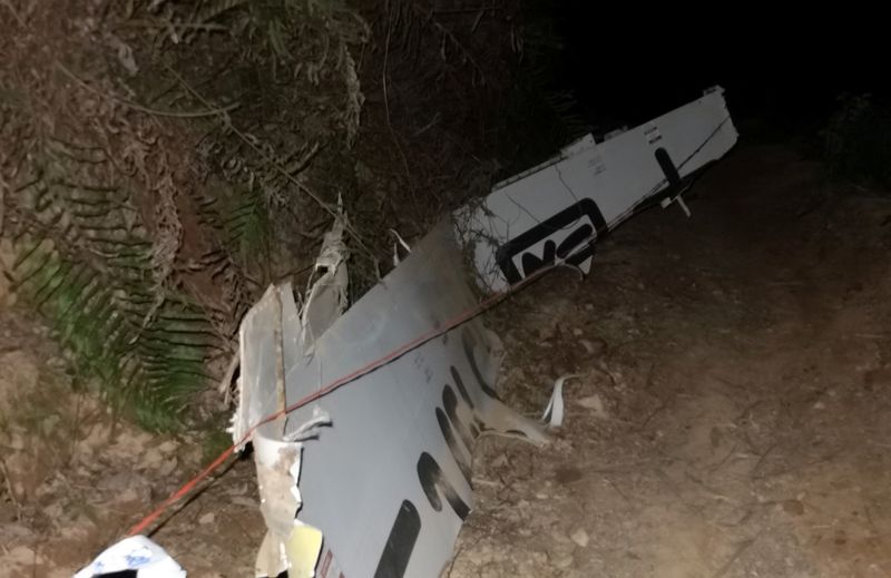 Plane debris is seen at the site where a China Eastern Airlines Boeing 737-800 plane flying from Kunming to Guangzhou crashed, in Wuzhou, Guangxi Zhuang Autonomous Region, China March 21, 2022. Picture taken March 21, 2022. cnsphoto via REUTERS