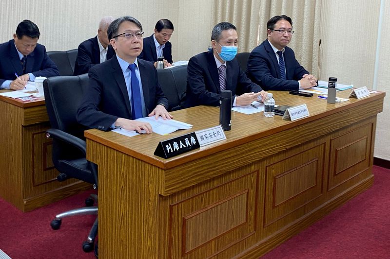 FILE PHOTO: Taiwan National Security Bureau Director-General Tsai Ming-yen (front desk on the left) attends a parliament session in Taipei, Taiwan June 12, 2024. REUTERS/Ben Blanchard/File Photo