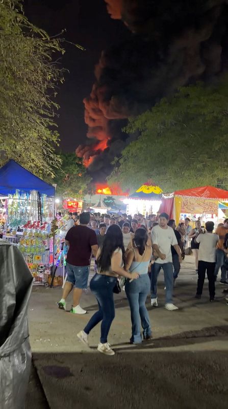 Smoke billows as flames rise during a deadly fire at Parque Tabasco in Villahermosa, Tabasco state, Mexico, May 7, 2026, in this screengrab obtained from a social media video. Sax Antonio Martinez/via REUTERS  THIS IMAGE HAS BEEN SUPPLIED BY A THIRD PARTY. MANDATORY CREDIT. NO RESALES. NO ARCHIVES. VERIFICATION: Reuters verified the location and the date when the footage was filmed from the metadata on the original files.