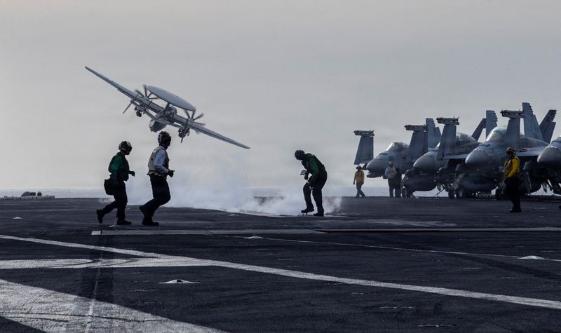 A surveillance aircraft launches from the flight deck of a U.S. Navy aircraft carrier during the Operation Epic Fury attack on Iran, March 31, 2026. U.S. Navy/Handout via REUTERS /File Photo