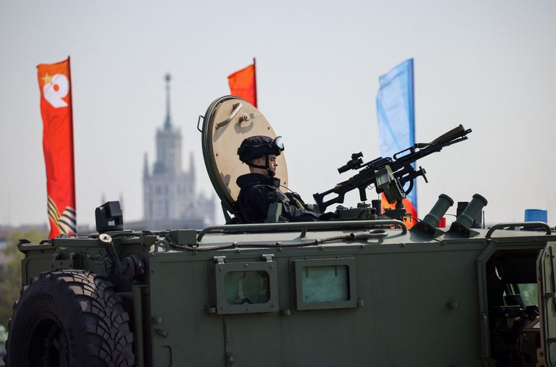 A Russian security officer remains atop an all-terrain infantry mobility vehicle amid increased security measures taken ahead of Victory Day, marking the anniversary of victory over Nazi Germany in World War Two, in central Moscow, Russia, May 7, 2026. REUTERS/Stringer