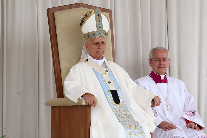 Pope Leo XIV leads a holy Mass in Piazza Bartolo Longo in front of the Shrine of the Virgin of the Rosary of Pompeii, on the first anniversary of his election, in Pompei, Italy, May 8, 2026. REUTERS/Guglielmo Mangiapane