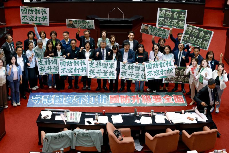 Taiwan's ruling Democratic Progressive Party (DPP) calls for support of the $25 billion special defence budget at parliament in Taipei, Taiwan, May 8, 2026. REUTERS/Ann Wang