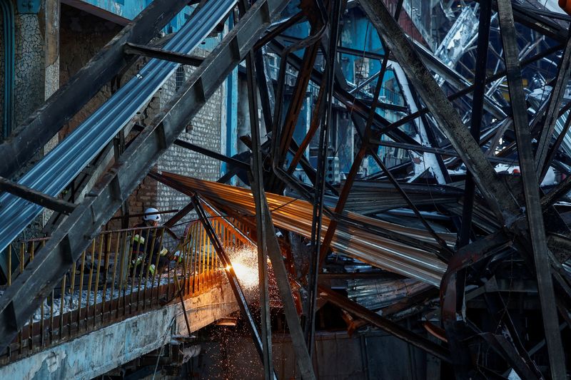 FILE PHOTO: Rescuers remove debris at a thermal power plant damaged by multiple Russian missile strikes, amid Russia's attack on Ukraine, in an undisclosed location in Ukraine February 9, 2026. REUTERS/Valentyn Ogirenko/File Photo