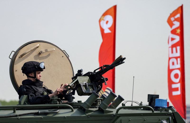 A Russian security officer remains atop an all-terrain infantry mobility vehicle amid increased security measures taken ahead of Victory Day, marking the anniversary of victory over Nazi Germany in World War Two, in central Moscow, Russia, May 7, 2026. REUTERS/Stringer