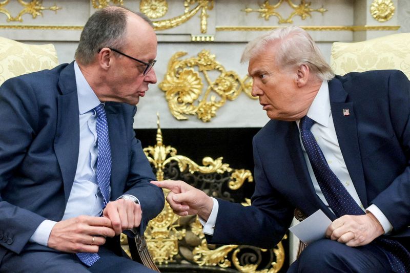 FILE PHOTO: U.S. President Donald Trump and German Chancellor Friedrich Merz meet in the Oval Office at the White House in Washington, D.C., U.S., March 3, 2026.  REUTERS/Jonathan Ernst//File Photo