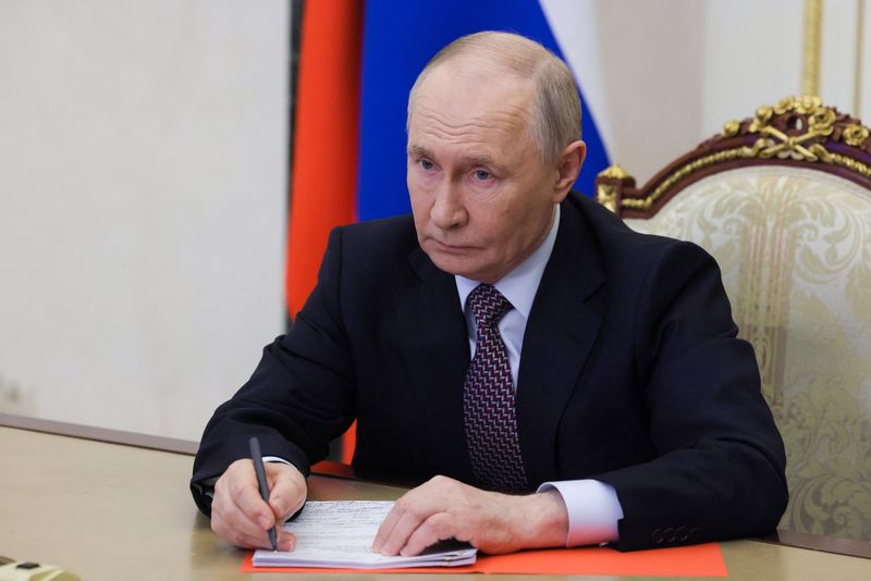 Russian President Vladimir Putin chairs a meeting with members of the Security Council via a video link at the Kremlin in Moscow, Russia May 8, 2026. Sputnik/Mikhail Metzel/Pool via REUTERS