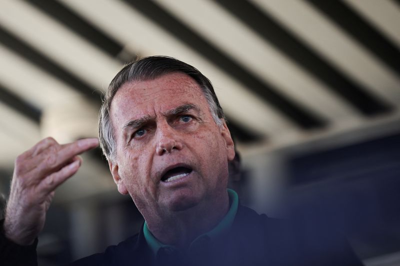 Former Brazilian President Jair Bolsonaro speaks to the media at the Federal Senate in Brasilia, Brazil July 17, 2025. REUTERS/Adriano Machado