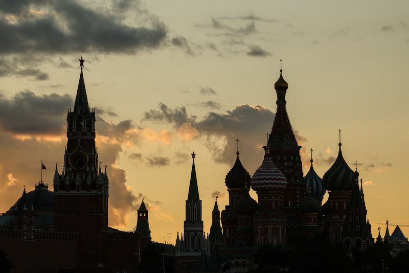 Kremlin's Spasskaya tower and St. Basil's Cathedral, during sunset in Moscow, Russia August 28, 2025.  REUTERS/Evgenia Novozhenina
