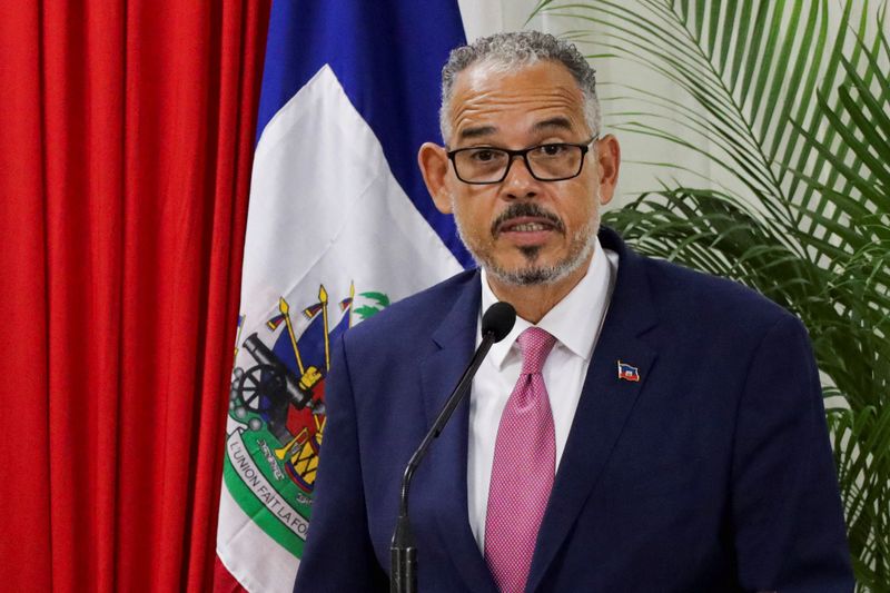 FILE PHOTO: Haiti's Prime Minister Alix Didier Fils Aime speaks during a ceremony on the day the mandate of the Caribbean nation's transitional governing council, a body intended to curb a bloody gang conflict and bring about long-delayed elections, ended with no succession plan in place, in Port-au-Prince, Haiti, February 7, 2026. REUTERS/Fildor Pq Egeder/File Photo