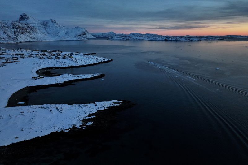 FILE PHOTO: A drone view shows a boat sailing on the shores of Nuuk, Greenland, February 7, 2026. REUTERS/Stoyan Nenov/File Photo