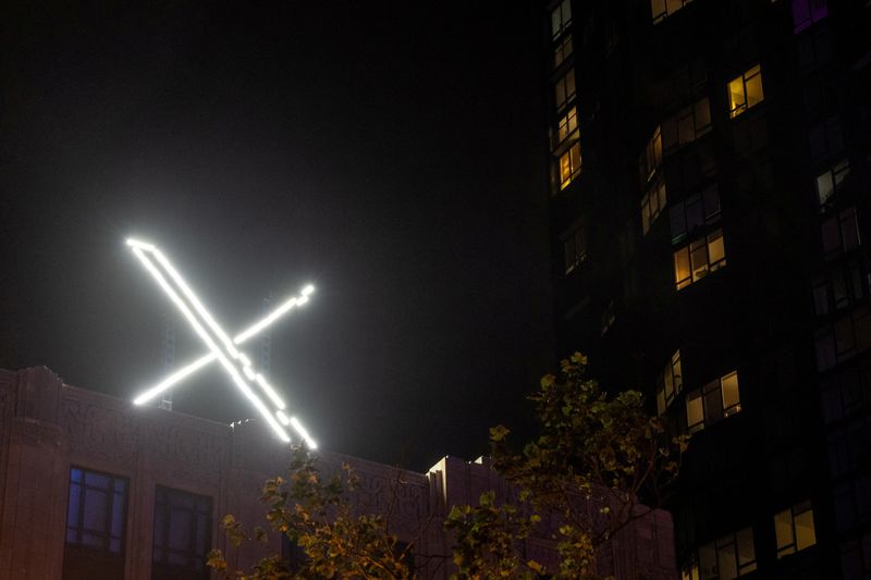 FILE PHOTO: 'X' logo is seen on the top of the headquarters of the messaging platform X, formerly known as Twitter, in downtown San Francisco, California, U.S., July 30, 2023. REUTERS/Carlos Barria/File Photo